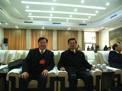 王董與最高人民法院院長、原湖南省省長周強在一起
